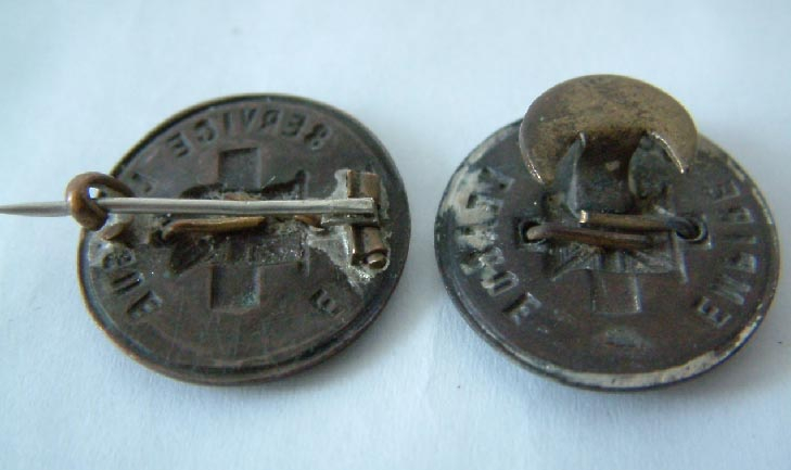 2 Empire Service League badges with silver centres, possibly military related